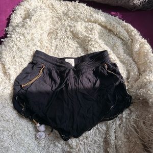 Black vintage shorts with threaded yellow size 4 fits very small